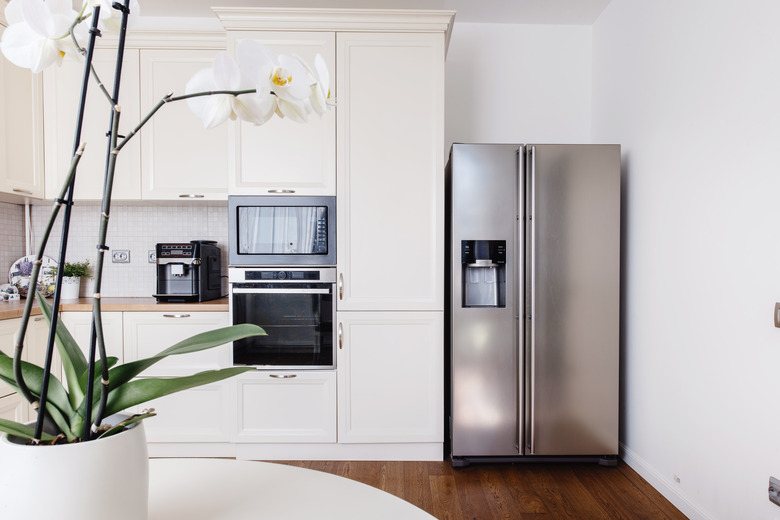 Modern appliances and new design in kitchen. Loft kitchen and apartment