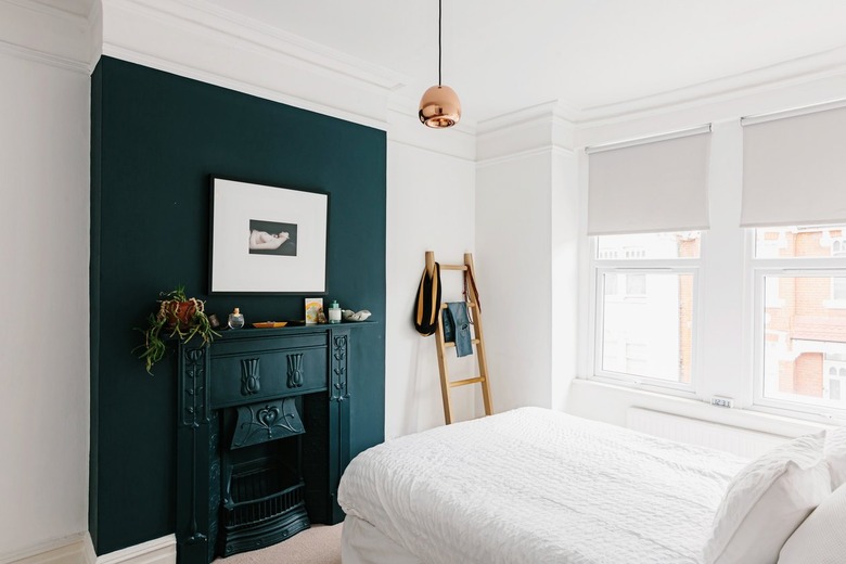 bright white room with forest green accent wall