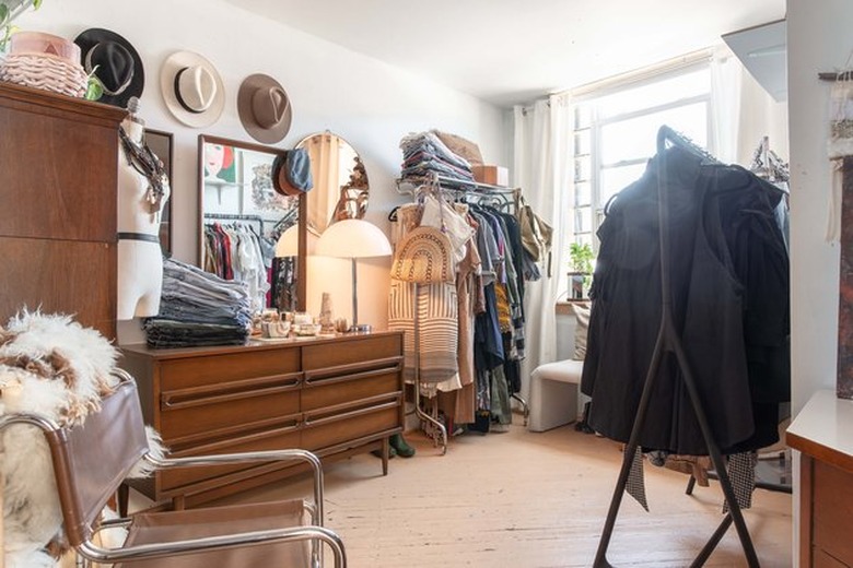 Freestanding industrial closet ideas with MCM dresser