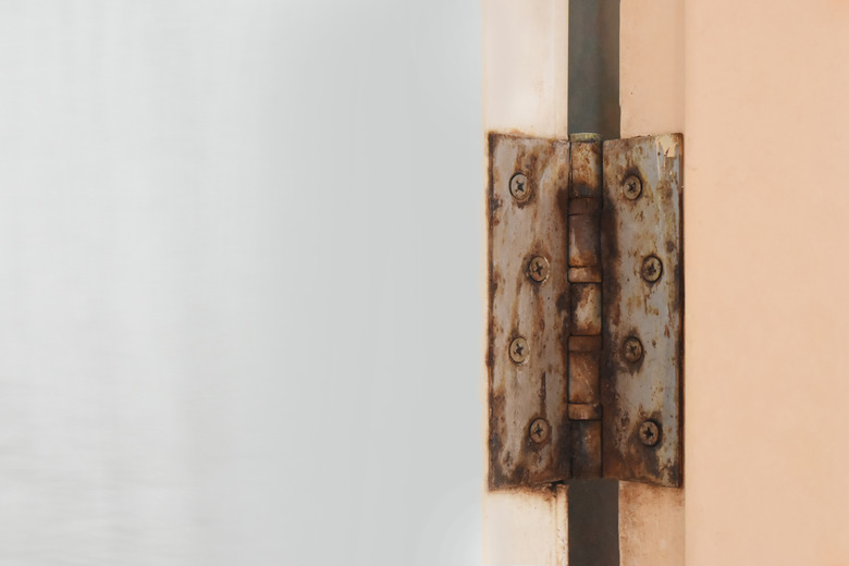 Bathroom door hinge rust.On the door of PVC waterproof and empty space for text.