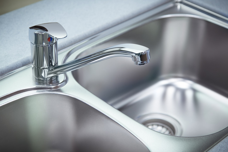 Clean chrome tap and washbasin