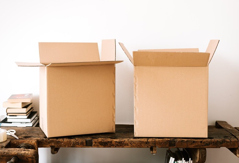 Cardboard boxes on a wooden table