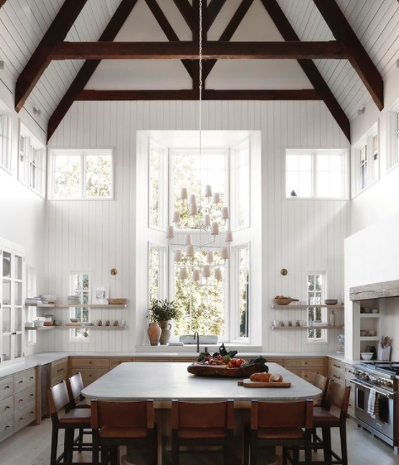 White farmhouse kitchen with high ceilings