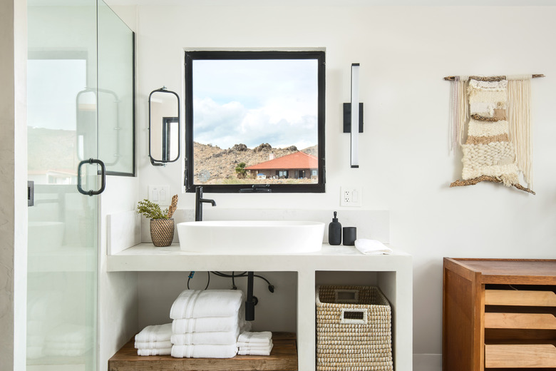 bathroom vanity and sink, and storage options