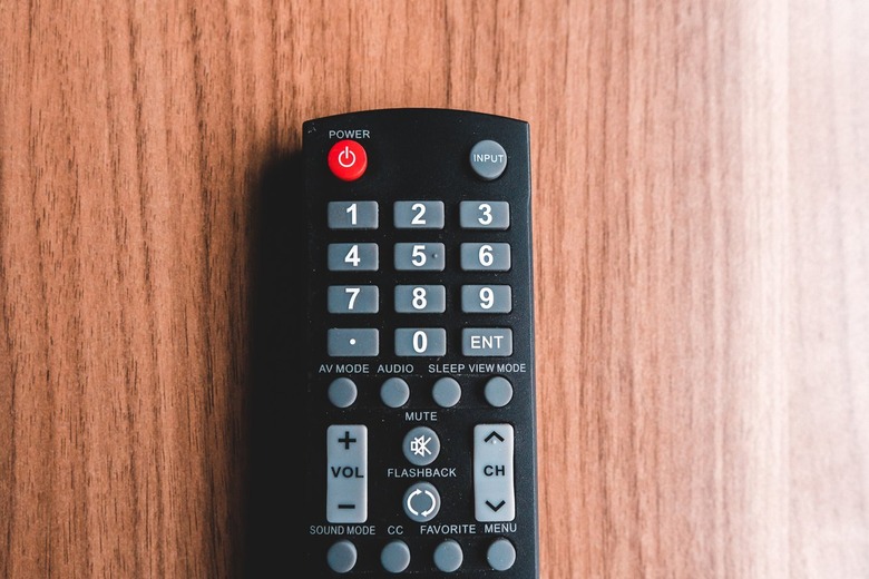 Remote control on a wooden table