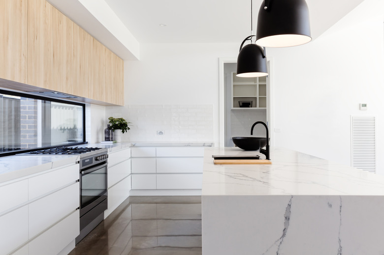 Luxury industrial kitchen with a marble island