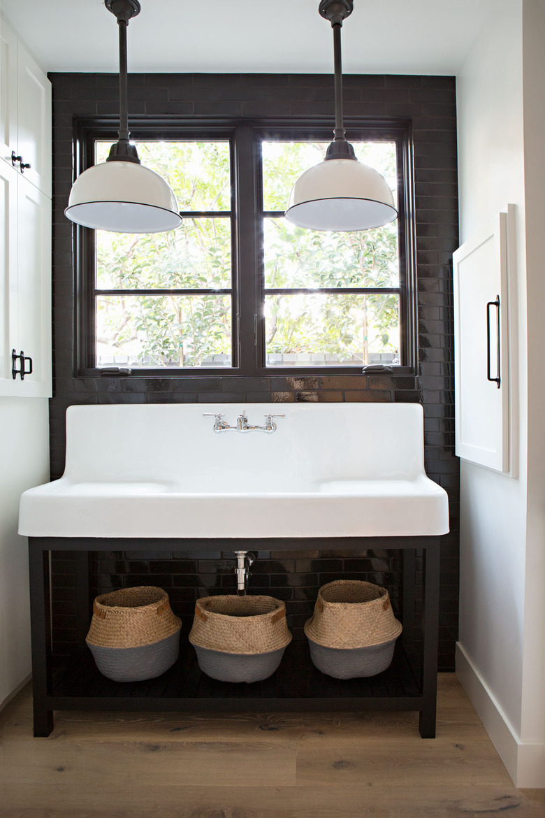 modern farmhouse bathroom with large trough Farmhouse Bathroom Sink and industrial pendant lighting