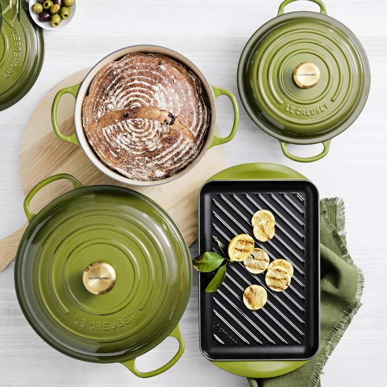 Le Creuset cookware on a white background