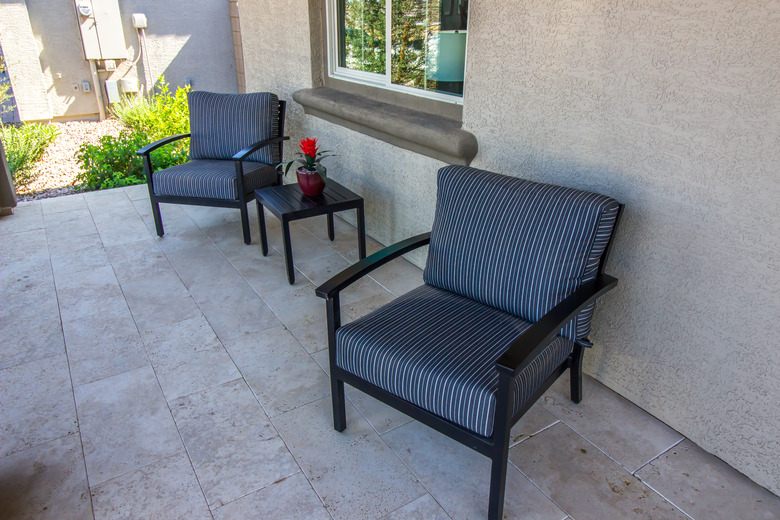 Front Patio With Small Table & Two Arm Chairs With Striped Cushions