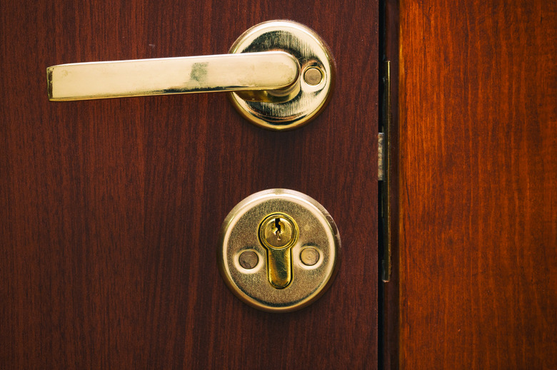 Door handle gold color with a lock