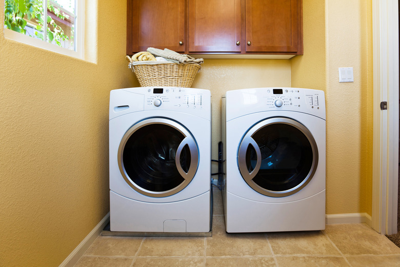 White modern washer and dryer in home