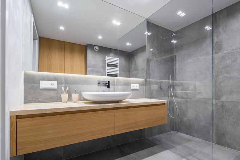 Bathroom with shower and mirror