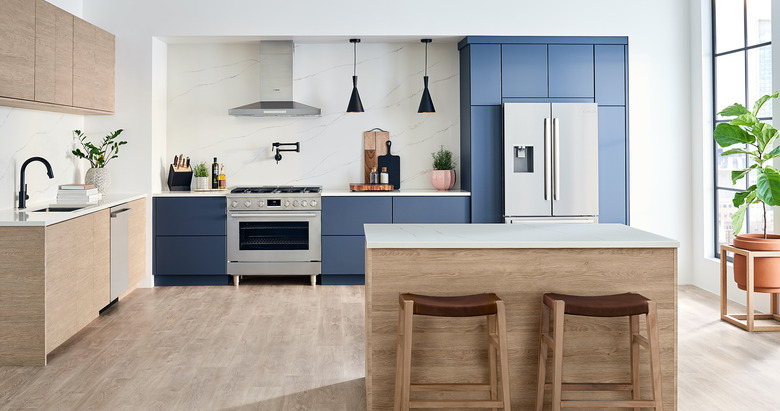 stove brand Bosch in a blue and brown kitchen with stove and kitchen island