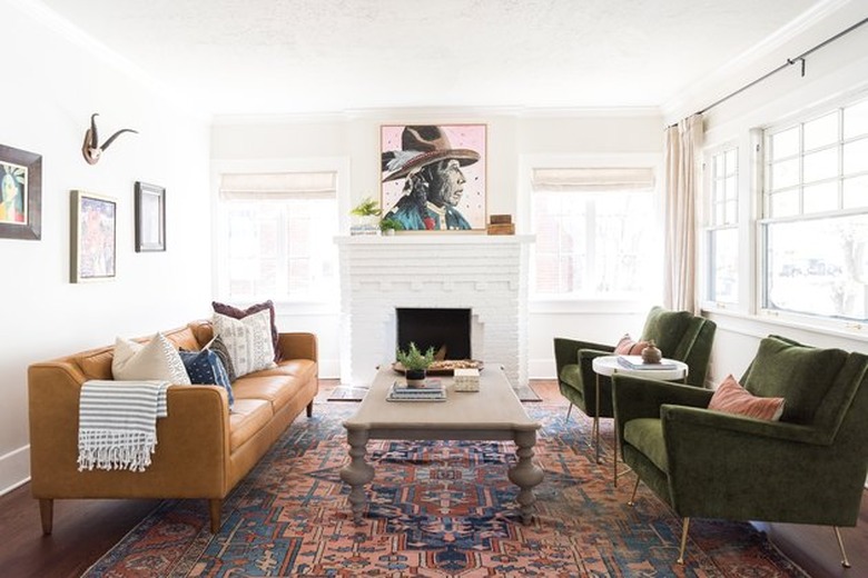 white painted brick Craftsman style fireplace in living room