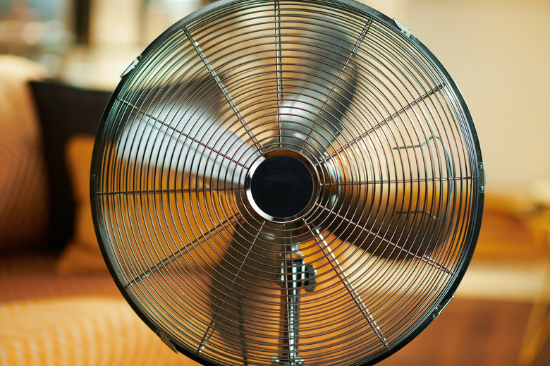 Closeup on working metallic floor standing fan