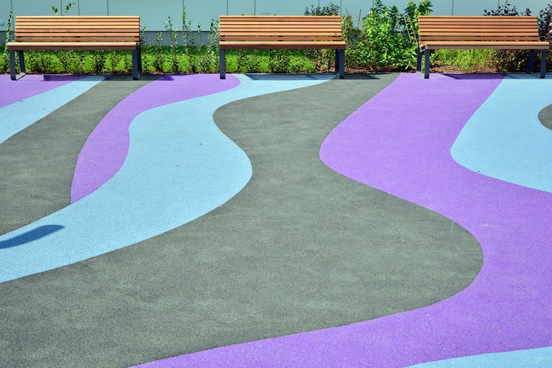 Playground rubber flooring. Colorful landscape.