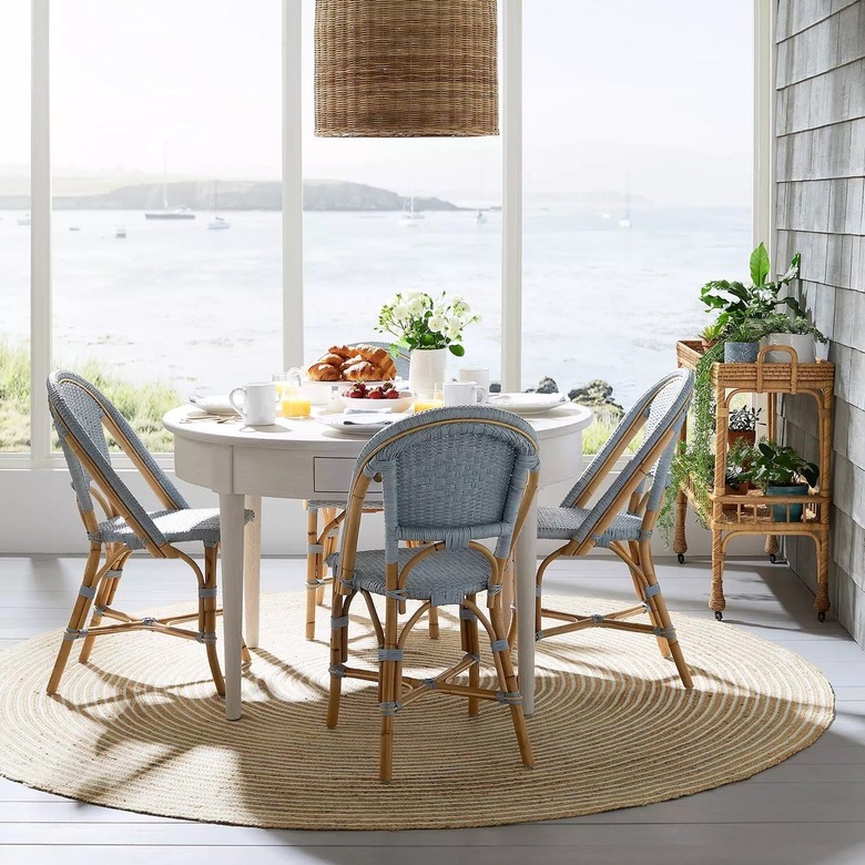 round jute rug in coastal dining room