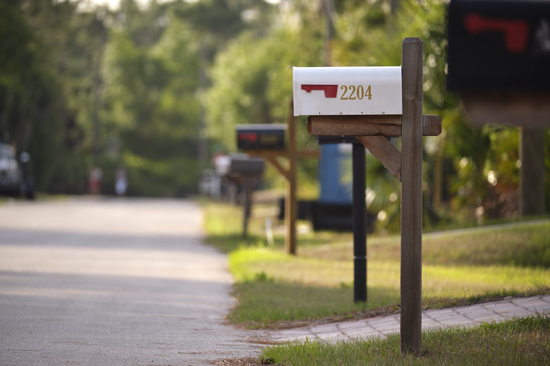 Typical american outdoors mail box on suburban street side