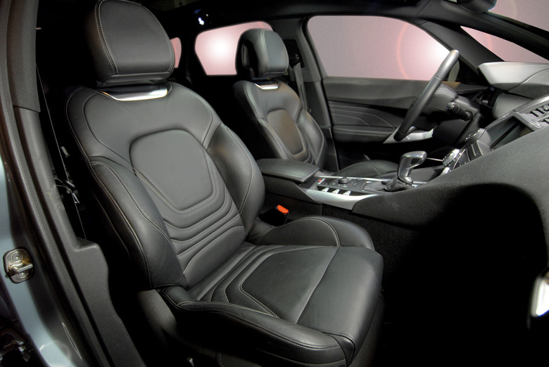 Leather seats - interior of black car.