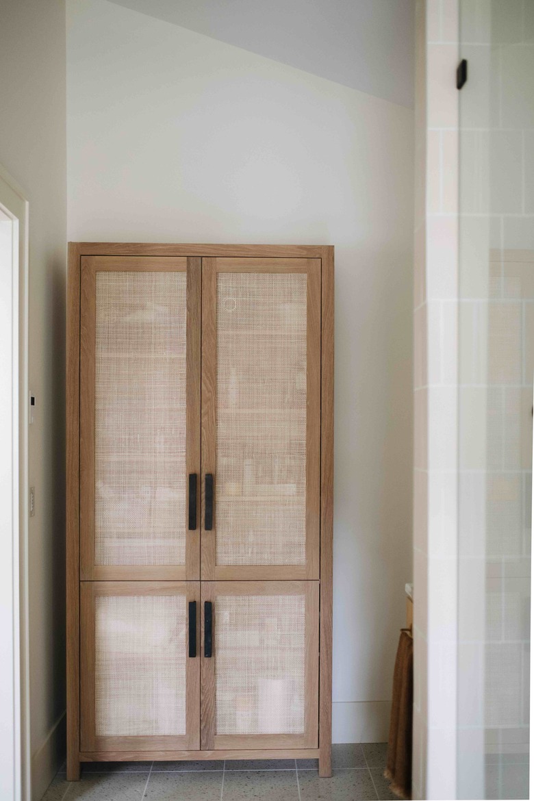 Modern bathroom storage with a cabinet by Prospect Refuge Studio