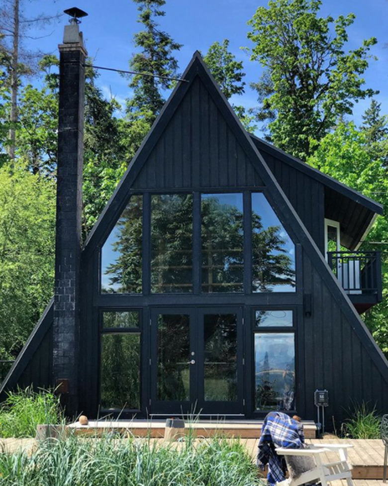 black A-frame with window facade