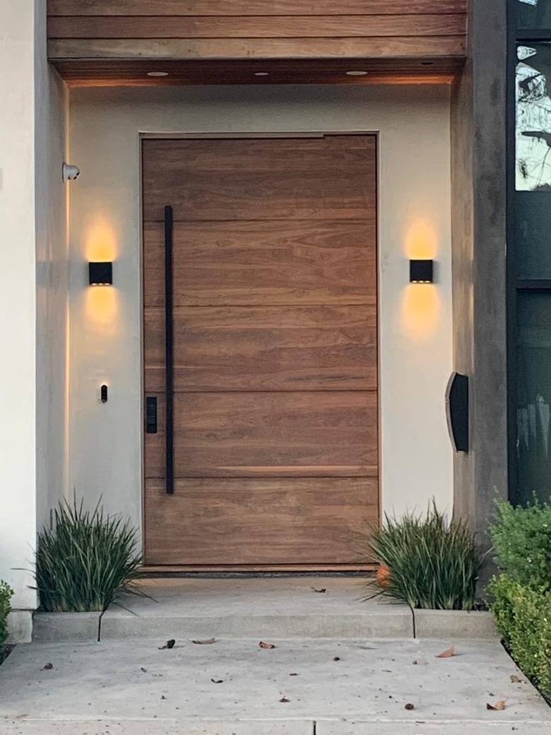 modern exterior door wood with long black door handle