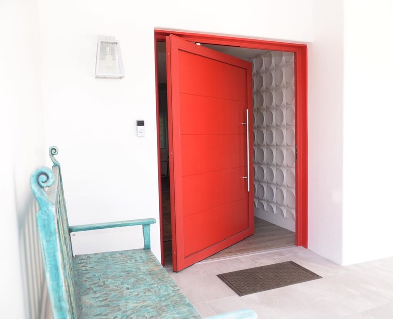 pivoting modern exterior door in red