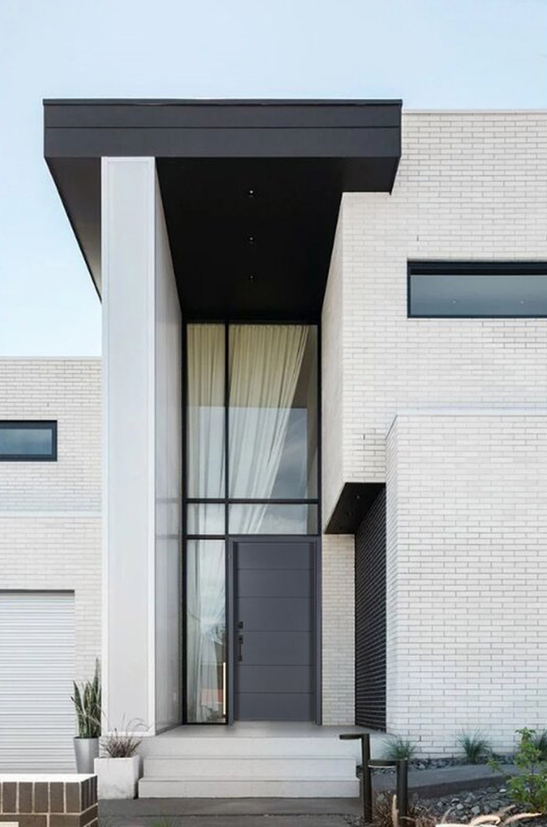 modern exterior door in black with linear doorway