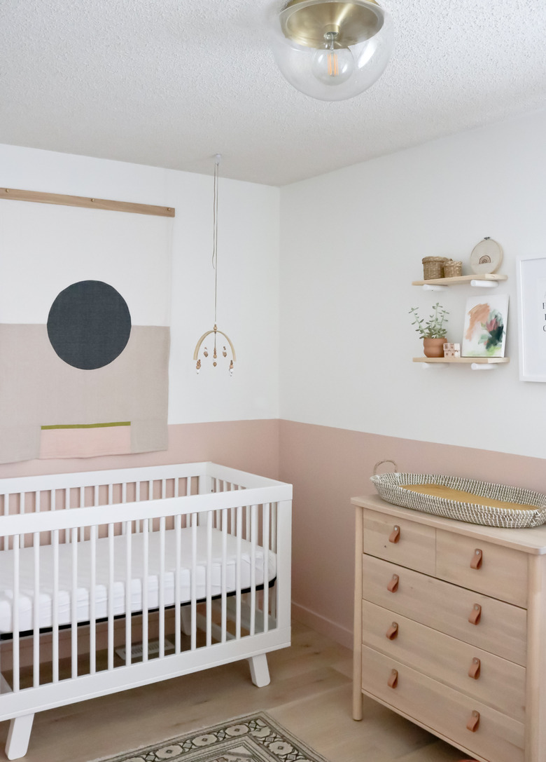 white and pink modern nursery idea with modern boho decor