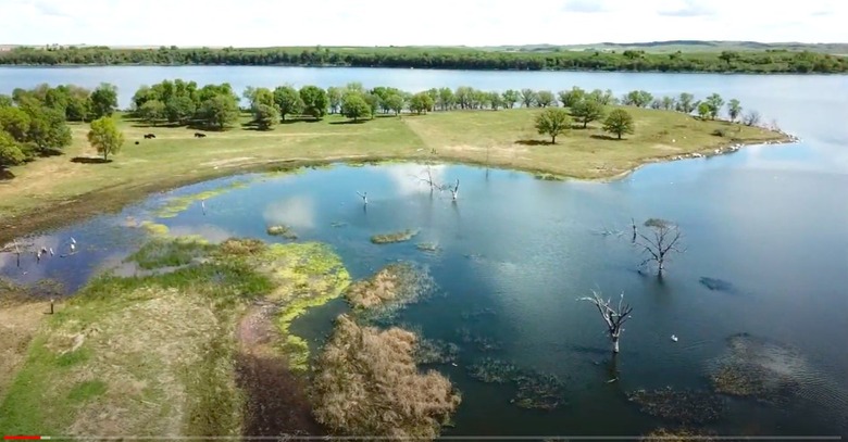 view of lake with land nearby