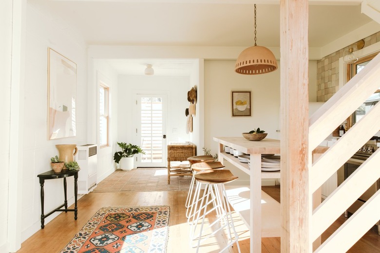 pendant lamp and wooden bar stools with wooden kitchen island