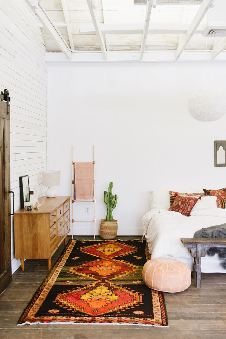 bohemian bedroom with pillows on bed