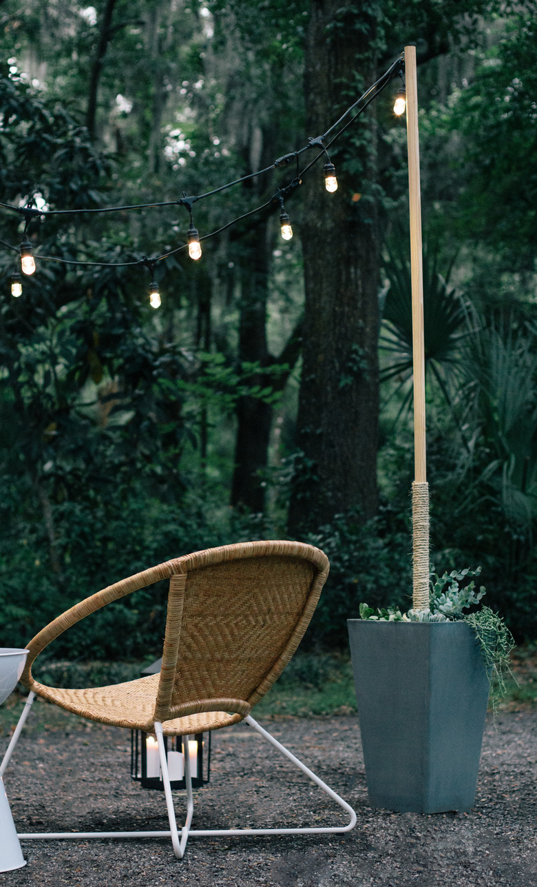 Outdoor idea with modern outdoor chair and string lights