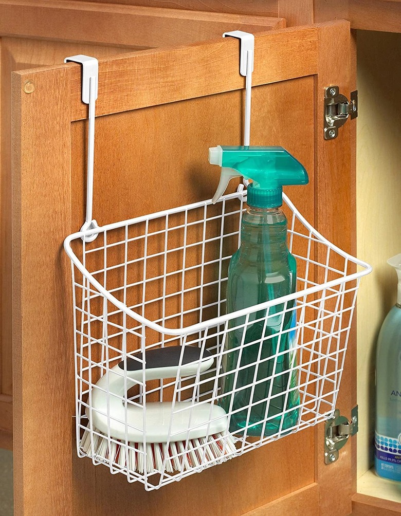 white metal over the cabinet door basket