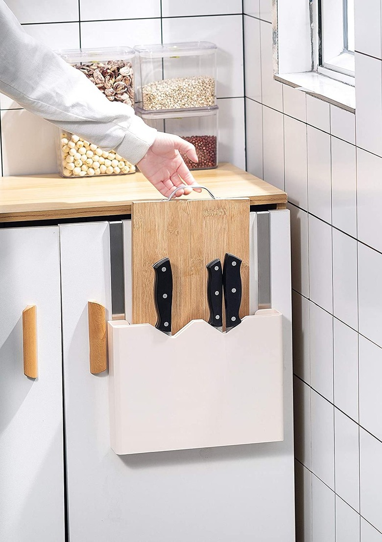 over the cabinet door cutting board holder