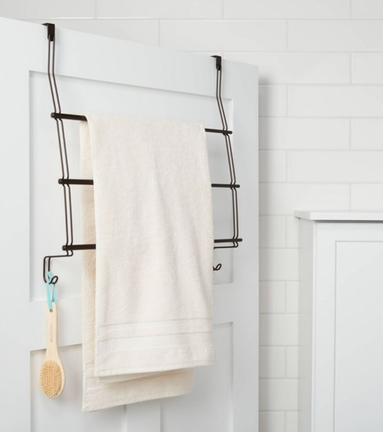 Over the Door Storage with Towel hanging on over the door rack.