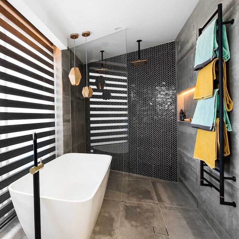 Modern bathroom with wall mounted shelving.