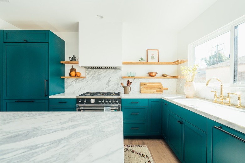 teal kitchen cabinets in modern kitchen