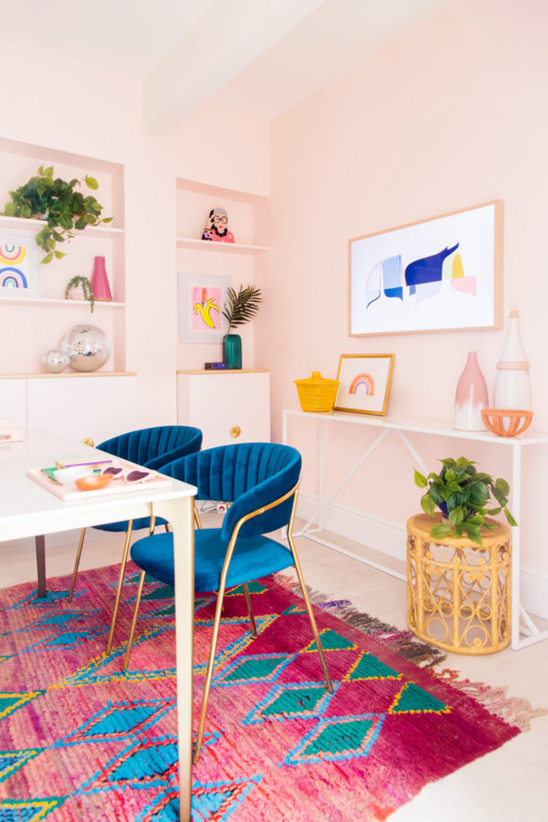 Pantone Color of the Year Classic Blue seen in chairs placed in colorful office