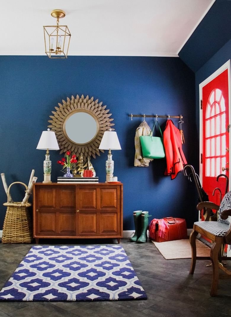 Pantone Color of the Year Classic Blue in an entryway paired with a red door