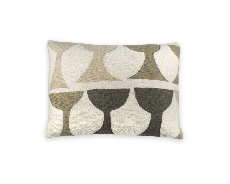 A rectangular pillow featuring a goblet pattern in white, cream, and gray.