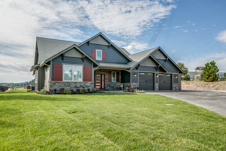 Brand new home with newly laid sod