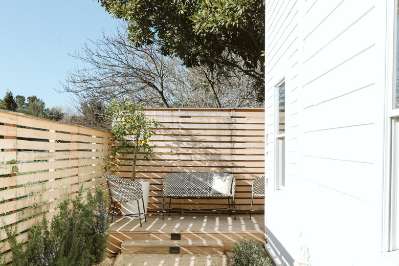 patio with wood fence enclosure