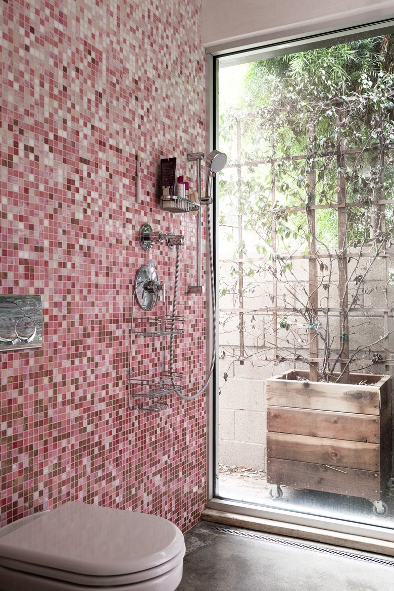 Pink bathroom backsplash in shower