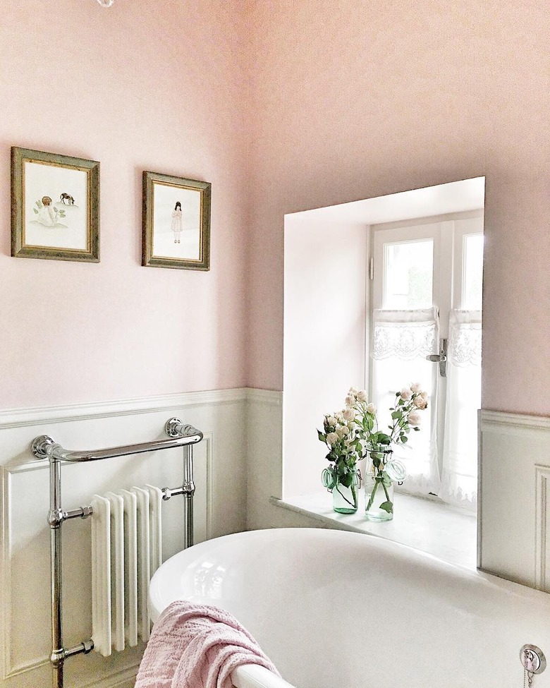 A pink bathroom in French country styling