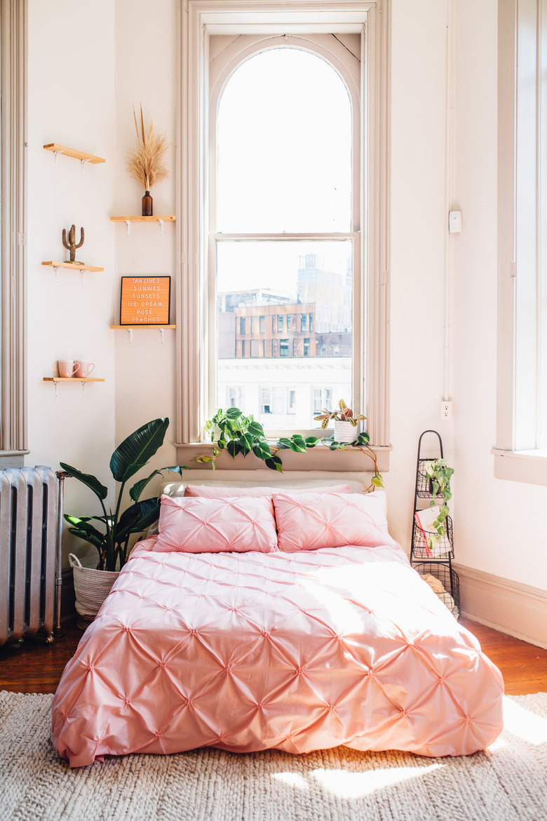 pink duvet cover and pillow shams in blush bedroom