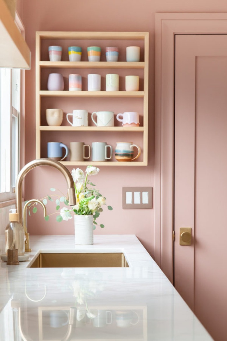 pink kitchen with pink door