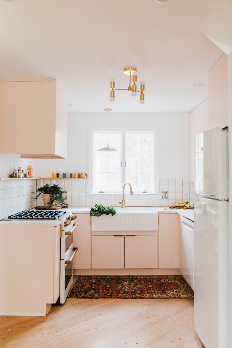 pink kitchen with midecentury style