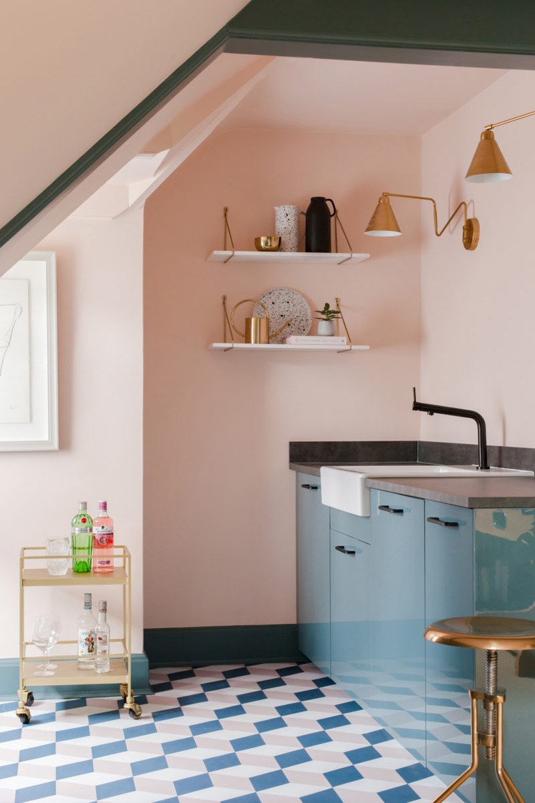 pink kitchen with blue and pink floor tile