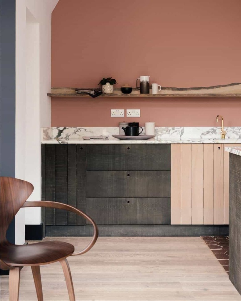 pink kitchen with dary gray cabinets